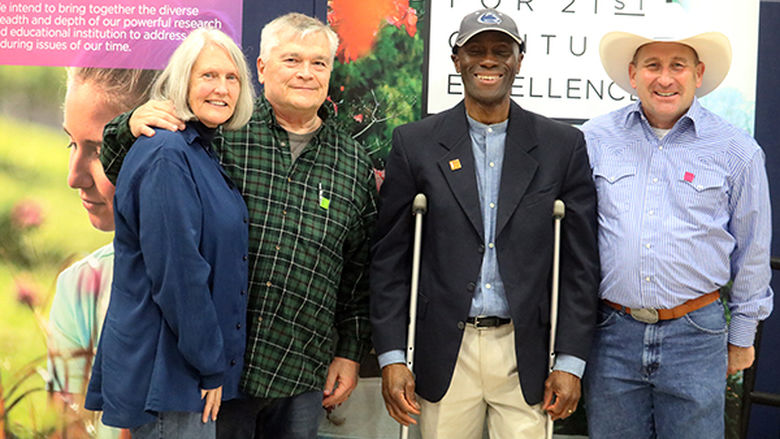 President Eric and Molly Barron with Chancellor Francis K. Achampong and Director of Development Randall Ackerman.