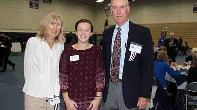 Cindy and Page Etchison visit with Andrea Peckman, recipient of the Page & Cindy Etichison Trustee Scholarship.