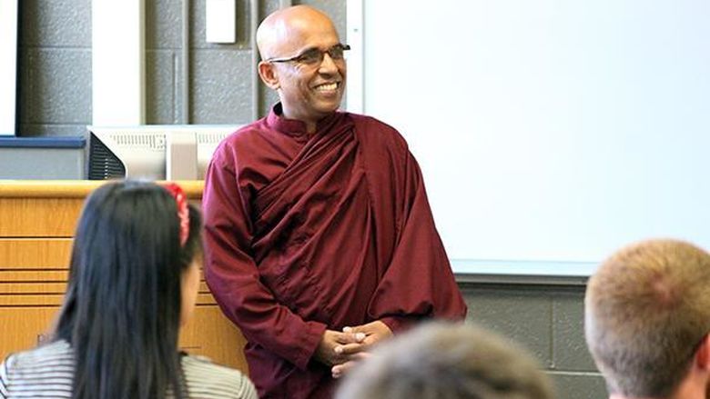 The Venerable Bhante Sujatha, a Buddhist monk, speaks to a class at Penn State Mont Alto 
