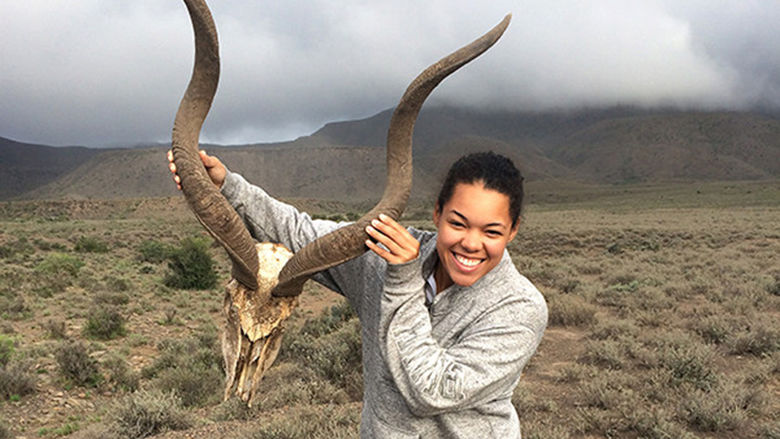 Erica Newton with the skull of a kudu - a species she studied in South Africa