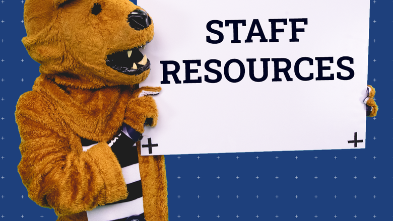 Lion mascot with sign that reads "Staff Resources" 