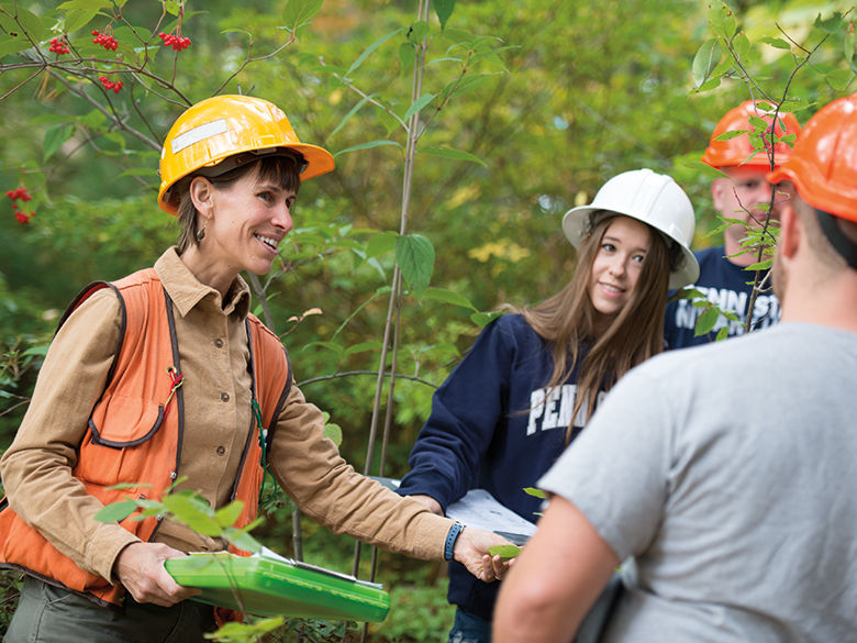 Penn State Mont Alto forestry professor talks with forestry students