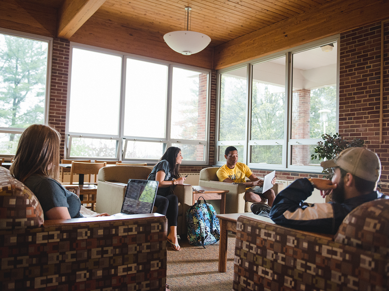 Students sitting in residence hall