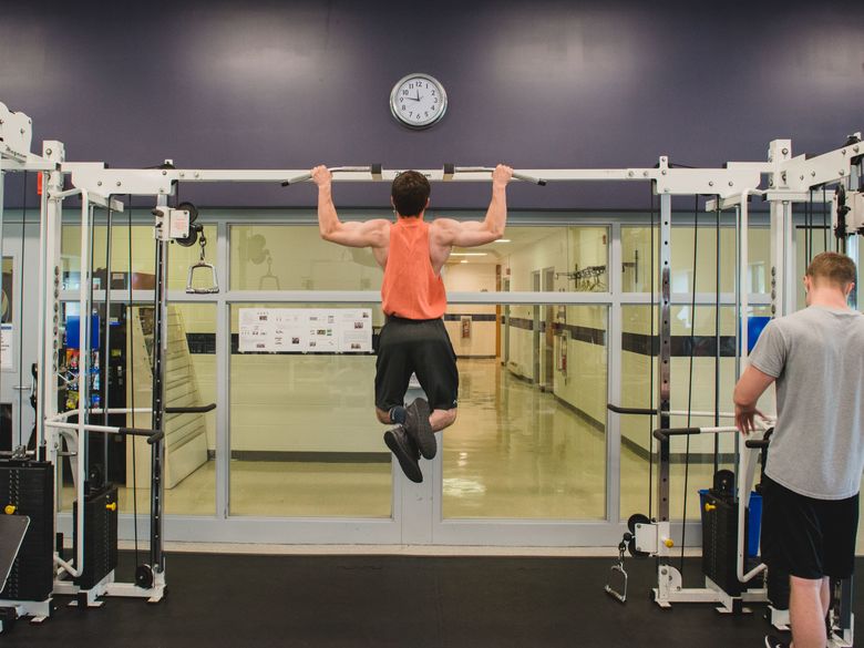 Student uses weight room at Multipurpose Activities Center (MAC)