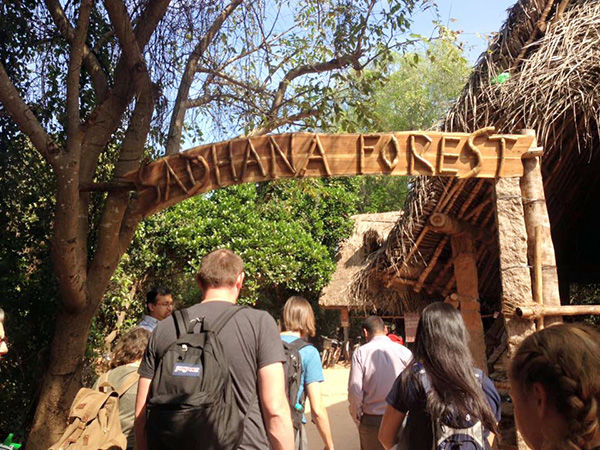 Students enter Auroville and entrance to the Sadhana Forest.