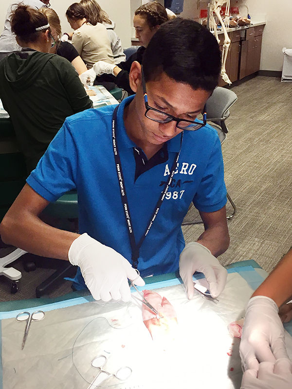Enrique Del Leon-Raya learns to suture.