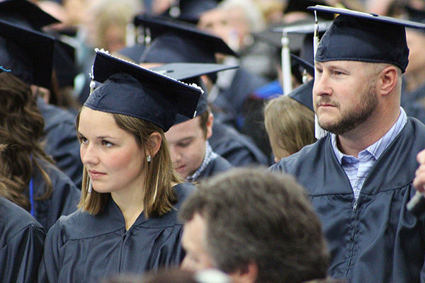 Penn State Mont Alto graduates wait to receive their diplomas.