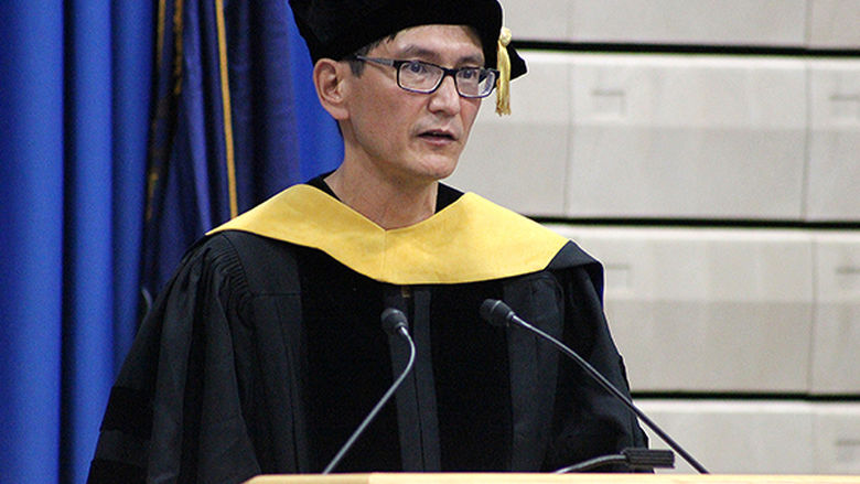 Dr. Ermek Nurkhaidarov, associate professor of mathematics, presented members of the faculty to the incoming class.