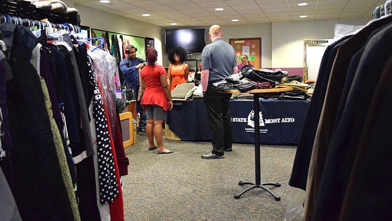 Students "shop" for donated business attire at Career Closet