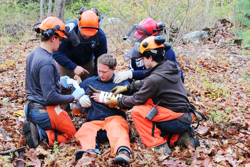 Penn State Mont Alto forest technology students provide first aid during trauma-scenario training event.