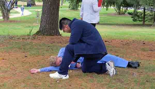 Ben Cai Checks on a Casualty Ben Cai Checks on a Casualty
