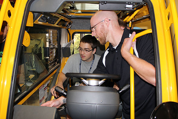 Glen Horst learns how to operate a crane from Manitowoc Training Instructor Charlie Reeder.